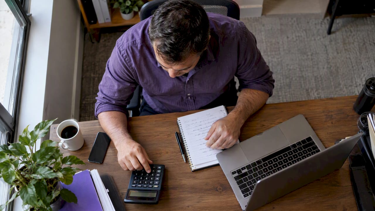 Brokerage owner weighs hiring against software